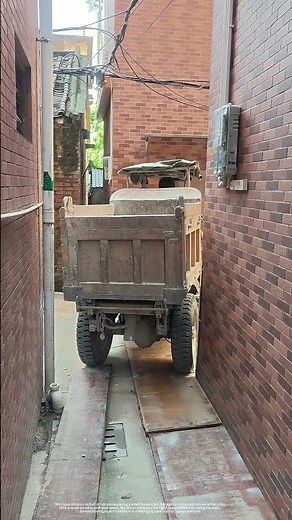 Maneuvering a Small Dump Trike Through an Extremely Narrow Alley