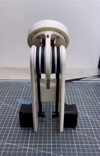A unique aspect of belt drives are their ability to be twisted & crossed to change the direction & axis of rotation.Not all belts can handle this & you have to be careful not to exceed design limitations of the belt, but you can solve tricky problems by using a twisted design.