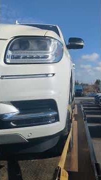 Loading a new Lincoln Navigator to take home to it's new owner