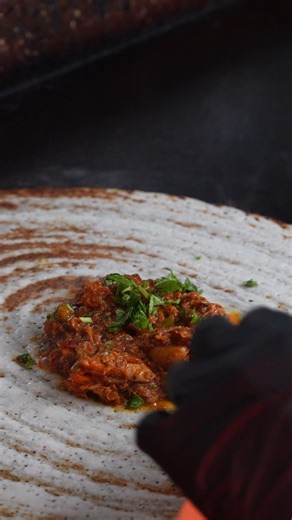 Our Chicken Masala Dosa is made with a perfectly golden dosa, filled with slow-cooked, aromatic chicken masala that hits every craving 🤤 A perfect blend of spice, comfort, and crunch—one bite and you’ll know why this is a favorite! 📍 145 Mapleview Dr W, Barrie 📞 (705) 727-1116 Come hungry. Leave happy. #BarrieEats #DosaEatery #ChickenMasalaDosa #Ontario #IndianCuisine | Dosa Eatery