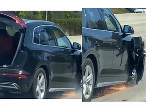 WATCH: Woman driving on three wheels on busy freeway gets into accident