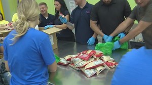 Volunteers package meals for Houston's hungry in the Backpack Buddy program | How you can help