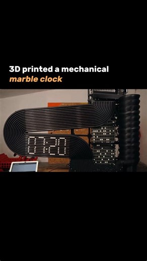 Steller Sphere on Instagram: "3D printed mechanical marble clocks are intricate, kinetic timepieces that use balls or marbles in tracks, ramps, and lifts to display hours and minutes. Key designs include the Tipping Marble Clock by Engineezy (using teeter-totter tracks) and larger, Arduino-controlled, or solenoid-driven models like those created by Ivan Miranda. These functional art pieces often require substantial 3D printing (250x250mm+), specialized hardware like bearings, and careful assembl
