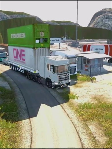 truck carrying stacked EVERGREEN and ONE shipping containers #est2 #dangerousplaces