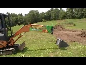 Turn Your Mini Excavator into a “True” Tool-Carrier with the XBoom Coupler System!