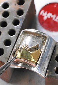 Beautiful landscape ring created out of coins! | Parentips