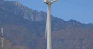 Detail of windmill. Modern wind power machines are use to create electricity. These are called wind turbines by engineers or windmills by the average person. Stock Video