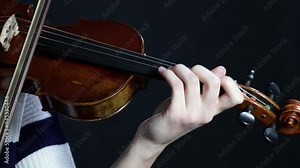 Girls plays the violin. Close-up of hands playing the violin. Woman, violin musician, playing. Stock Video