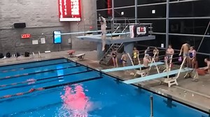 High flying, pre-competition low board diving warm-ups, UNLV Swim & Dive vs. BYU Swim and Dive meet, UNLV Rebels in black suits, BYU Cougars in blue suits. They may have job offers from Cirque du Soleil on the Strip in the near future. UNLV Athletics | Ian Harrison