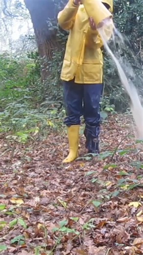 Emptying my yellow wellies from Mountain Warehouse of water after flooding them in a stream