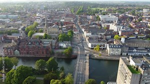 High Angle Footage of Historical Bedford City of England During Sunny Day of 28-May-2023. The Footage Captured with Drone's Camera from Medium High Altitude over the City and River Ouse and Station.