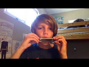 me playing my harmonica
