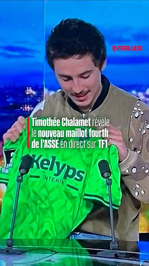 interlude on Instagram: "🟢 L'AS Saint-Étienne a profité du passage de Timothée Chalamet en France pour dévoiler son nouveau maillot fourth L'acteur a reçu le maillot des mains d'Anne-Claire Coudray lors du JT de TF1 ce dimanche soir. 🎥 : @tf1"