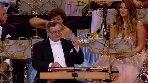 15M views · 52K reactions | Let's start the week slowly with our most motivated and enthusiastic Orchestra member Frédéric Jenniges playing his Zither   The Third Man from the DVD Magic of Maastricht | André Rieu | Facebook