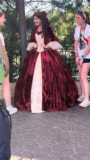 There’s something there that wasn’t there before… It’s Belle in her Christmas gown!