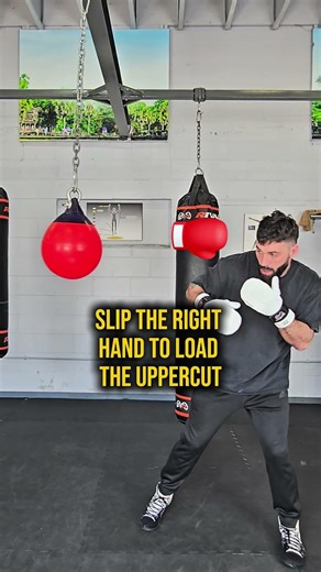 Slip the right hand to run them into the uppercut. #boxing #boxingtraining