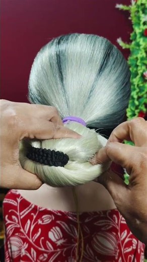 Updo bun hairstyle for long hair ladies