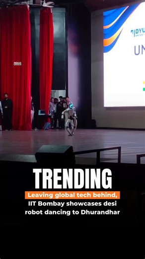 India | Trending | Updates on Instagram: "At IIT Bombay Techfest 2025, a humanoid robot grabbed attention with an unexpected blend of high-end engineering and Bollywood pop culture. The robot performed a smooth and rhythmic dance to the viral track Fa9la (Sher-e-Baloch), leaving students and tech enthusiasts amazed. Nicknamed “Chitti Dakait” by netizens, the performance stood out for its human-like movements inspired by actor Akshaye Khanna’s style in Dhurandhar. Tech enthusiasts later identifie