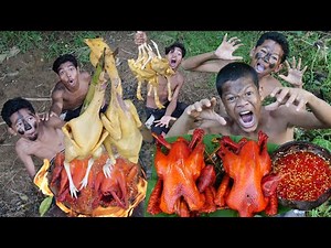 Survival in the rainforest - Primitive cooking chicken eating delicious on the forest