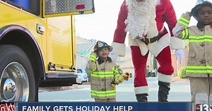 Firefighters deliver toys to young fire victims