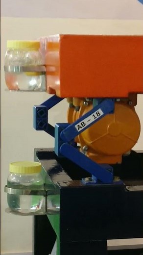 vibration table with bottles to show isolation of rosta springs