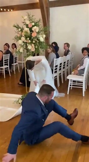 wedding turns into chaos when the groom falls after wires get tangled with the bride’s #funny #weddi