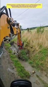 Drainage Ditch Maintenance by a Skilled Operator #excavator #work #workers