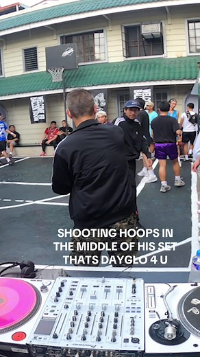 DJ Makes Basketball Shot During Live Performance