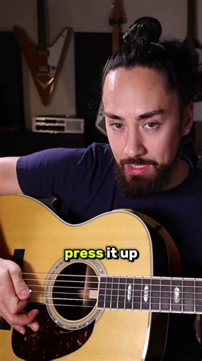 You are playing the acoustic guitar wrong