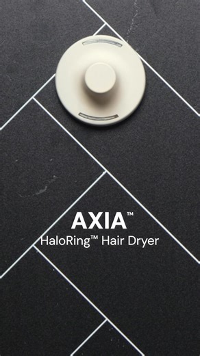 Dry faster and style smarter with the Axia™ HaloRing Hair Dryer—all without breaking the bank. Its unique circular design optimizes airflow to dry hair ultra-fast, while advanced ion technology and a brushless motor boost shine and reduce frizz for a silky-smooth finish that rivals your salon visits. | L'ange