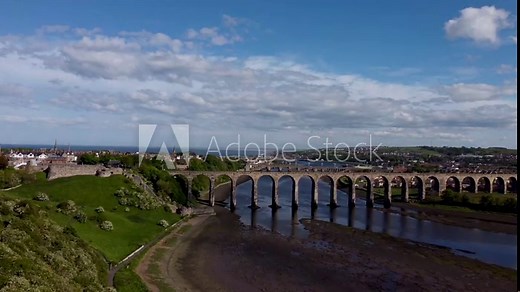 4k drone footage of the Royal Border Bridge spanning the River Tweed in Berwick, Northumberland, UK