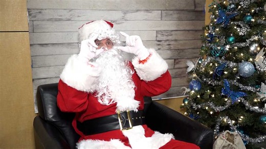 Santa Claus uses sign language to spread holiday cheer