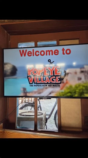 🌞🇲🇹 Just visited the set of Popeye in Malta — and it was AMAZING! 🎬🧂 Today I stepped into something truly whimsical — Popeye Village, the original film set from the 1980 musical Popeye starring Robin Williams! 🏘️✨ Nestled along the stunning northwest coast of Malta, this colorful village was built specially for the movie and has been delighting visitors ever since. 📖 A little history… Back in 1979, the musical Popeye was filmed here, and the production team constructed a whole seaside tow