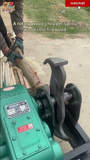 A rotary wood chopper splits wood into firewood