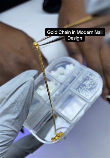 Elegant Modern French Nails with Gold Chain Accent
