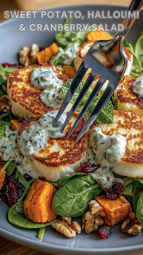 Sweet potatoes roasted golden. Sprinkle salt, pepper, olive oil. Bake at 400°F for 30 minutes. Pan-fry halloumi until crisp and golden. Toss with cranberries, spinach, and walnuts. Cool yogurt, mint, and lemon blend into a creamy, tangy dressing fresh, salty, and sweet in every bite. Ingredients ➤ 2 medium sweet potatoes, peeled and cubed ➤ 2 tbsp olive oil ➤ Salt and pepper, to taste ➤ 8 oz halloumi cheese, sliced ➤ ¼ cup dried cranberries ➤ 2 cups baby spinach or mixed greens ➤ ¼ cup toasted w