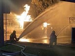 More than 50 firefighters battle ferocious blaze at petrol station