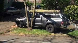 Driver trapped in truck under live power lines after crash in Eugene