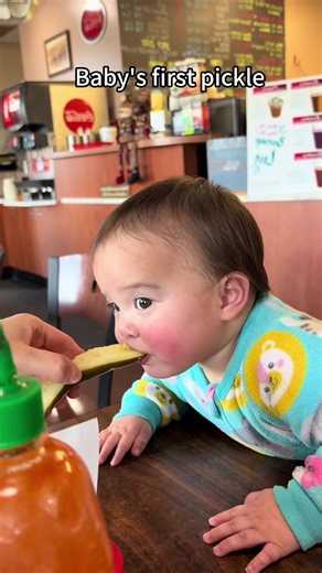 Baby's first pickle#funny #funnyvideos #funnykid #baby #funnybaby #babyfirst #kidsoftiktok #lmao
