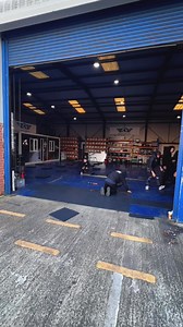 👌 Giving this workshop flooring a 🆕 look with our sleek graphite PVC tiles! ⬛️😎 #garage #garagefloor #garageflooring #workshop #garagestyle | Garage Style Ltd