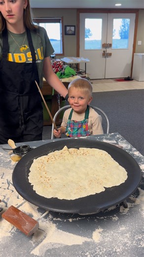 We teach them young. Ripp is 3 and he almost has grilling Lefse perfected. He only lost one Lefse on the way to the cooling table! #lefse #homesteadkitchen #lefsemaking #kidscooking | The Phat Hen
