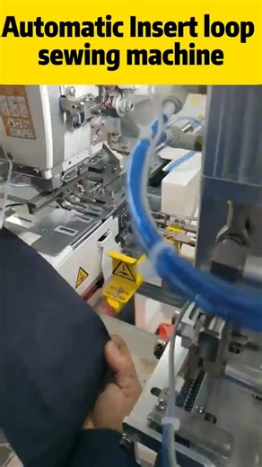 Automatic insert loop sewing machine