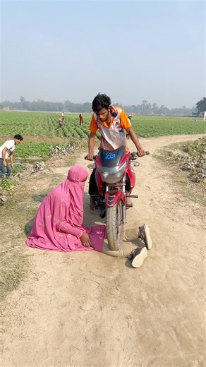 The motorbike wheel ran over the woman's leg.3