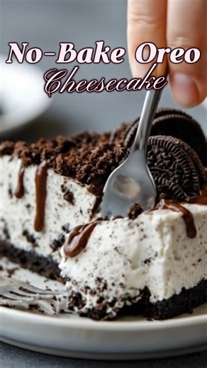 No-Bake Oreo Cheesecake 🍪🍫 This No-Bake Oreo Cheesecake is thick, creamy, and loaded with crushed Oreos in every dreamy bite. With a buttery Oreo crust, fluffy vanilla cheesecake filling, and chocolate drizzle on top, it tastes like something straight from a bakery case but it’s unbelievably easy to make at home. Save this No-Bake Oreo Cheesecake recipe for your next party, and tag a friend who’s obsessed with Oreos! Yield: 10 large servings Ingredients: • 2 1/2 cups Oreo cookie crumbs (about 
