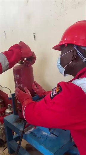 Pressurizing the Dry Powder Fire Extinguisher at NCDMB Fire Station - 2