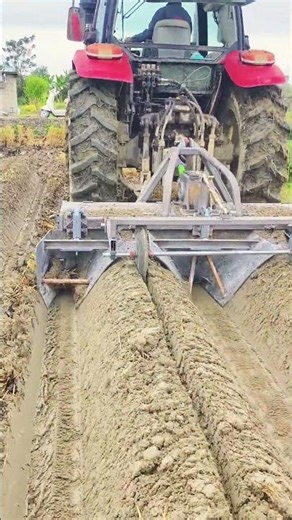 Precision Farming: Tractor Prepares Soil for Planting