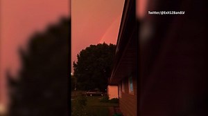You don't see this every day, a rainbow at sunset with lightning. | The Weather Channel
