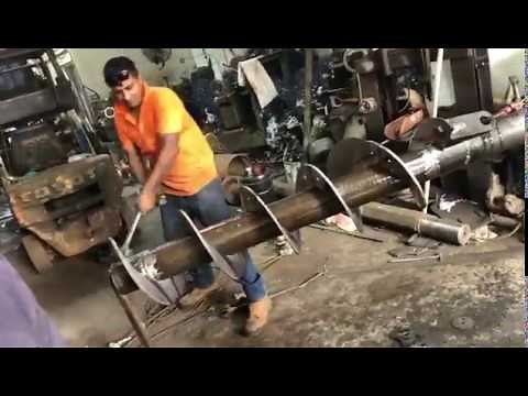 Fabrication - Pulling Auger Flights Manually