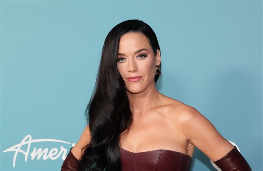 Katy Perry insisted a controversial scene in her 'Woman's World' music video is supposed to be "slap