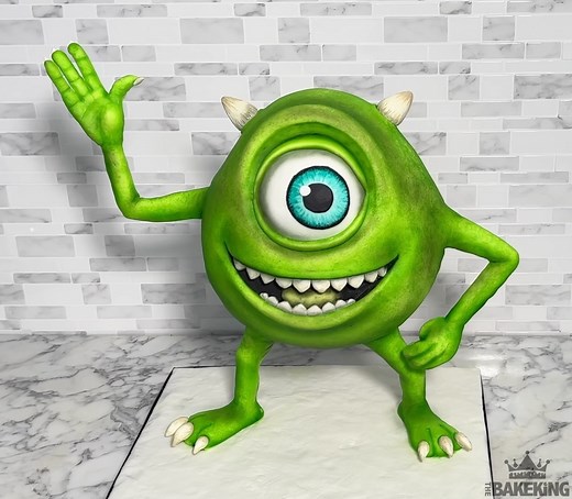 3.6M views · 61K reactions | Making Mike Wazowski from Monsters Inc All out of Cake! Mike is around 2 foot tall and is made from Vanilla Cake (coloured green) Chocolate ganache with Sugarpaste detailing Airbrushed as always with my Spectrum Flow | The BakeKing | Facebook